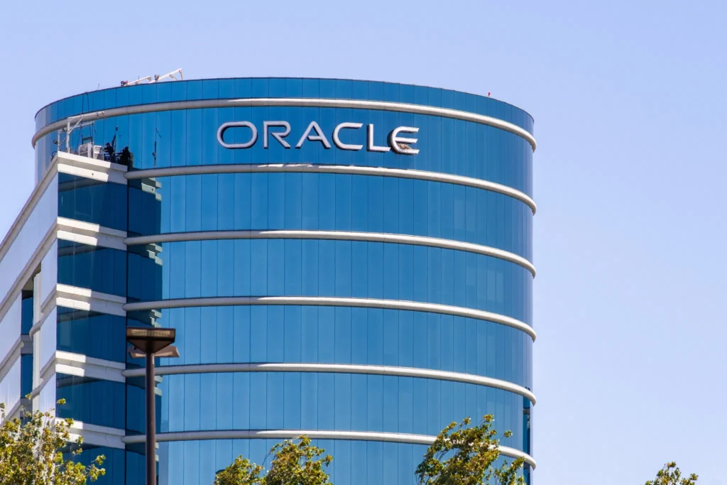 Oracle office building during global layoff and AI restructuring news