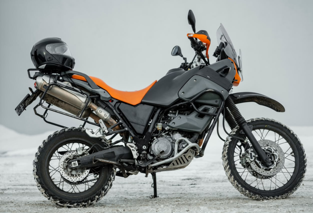 TVS Motor Ends Madison World Era, Moves Media Business to Dentsu TVS Motor and Dentsu logos representing the Rs 200 crore media mandate shift